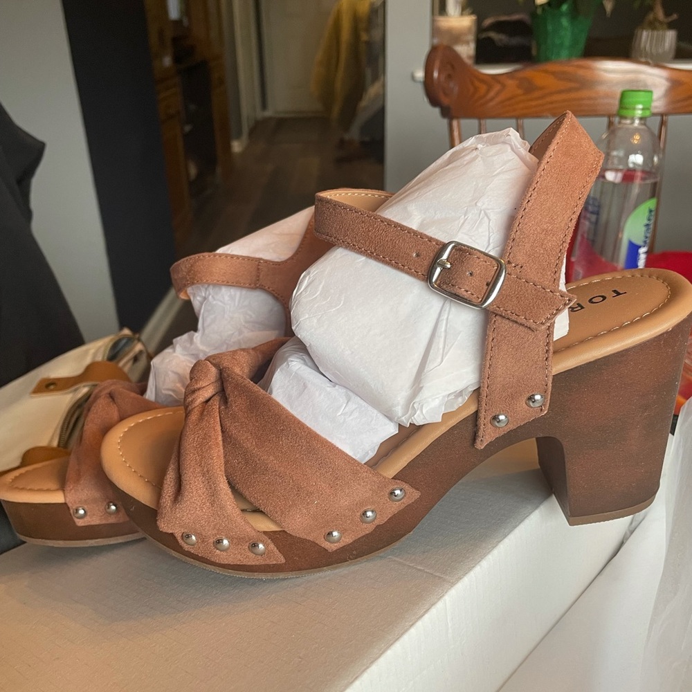 Brand new Torrid sandals in the box.